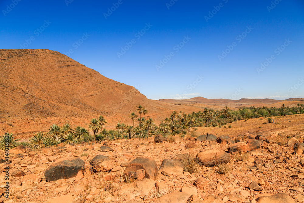 Beautiful Moroccan Mountain landscape in desert with oasis Beautiful Moroccan Mountain landscape in desert with oasis