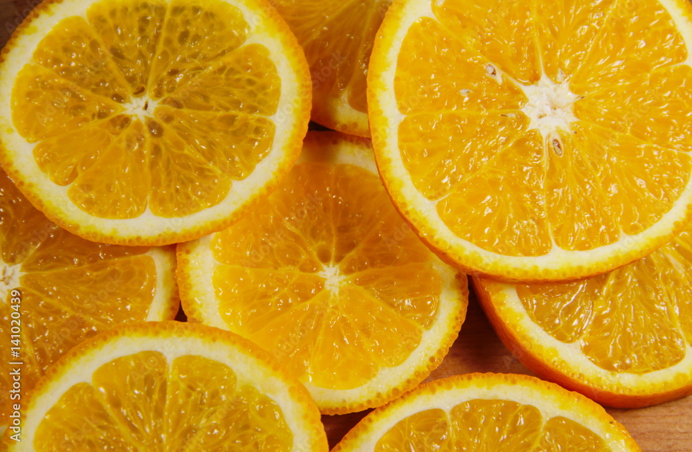 Background of sliced juicy oranges fruit Background of sliced juicy oranges fruit