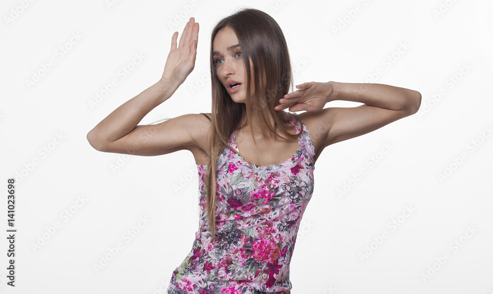 Portrait of beautiful girl model in casual summer clothes with no makeup on white background Portrait of beautiful girl model in casual summer clothes with no makeup on white background