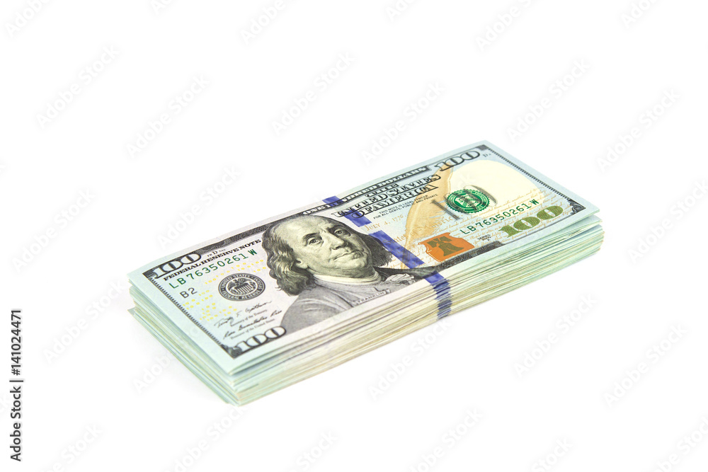 Stacks of dollars isolated on a white background. Close up Stacks of dollars isolated on a white background. Close up