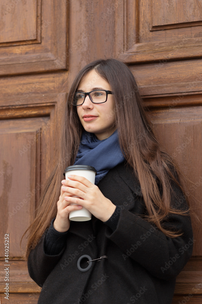Portrait of a beautiful girl with a glass Stock Photo | Adobe Stock