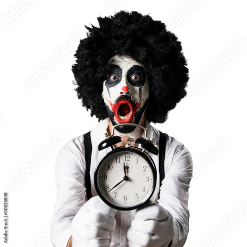 Killer clown holding vintage clock