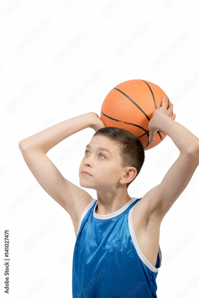Young caucasian teenage boy with a basketball Young caucasian teenage boy with a basketball
