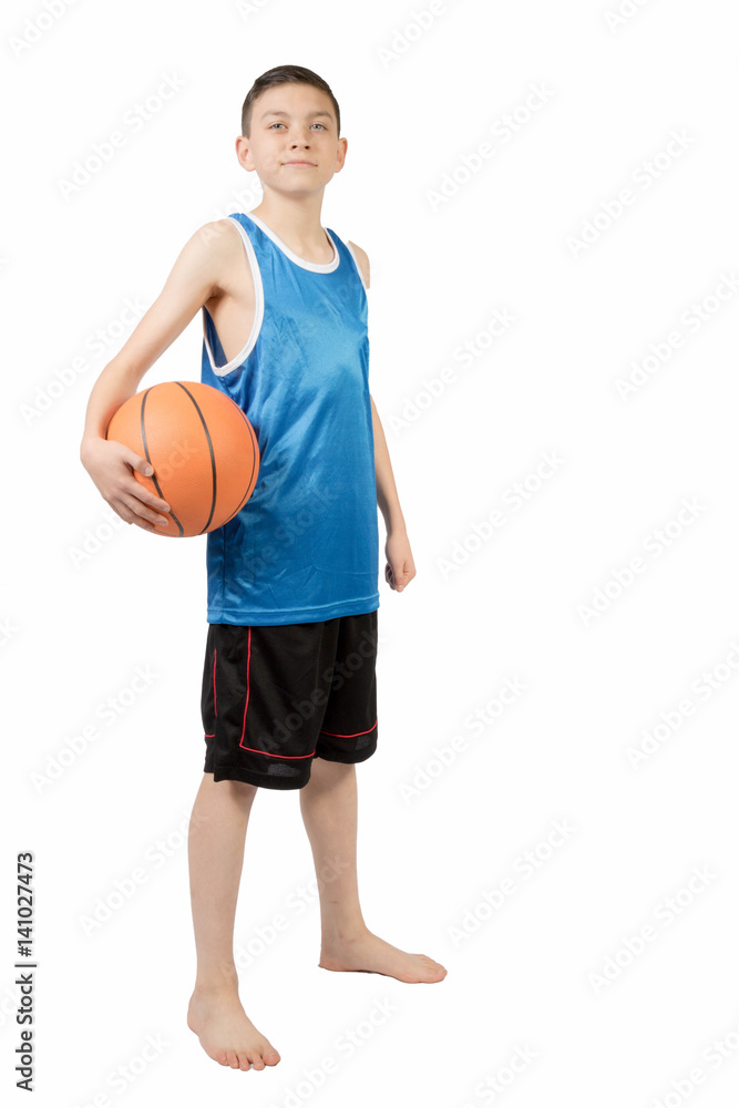 Young caucasian teenage boy with a basketball Young caucasian teenage boy with a basketball