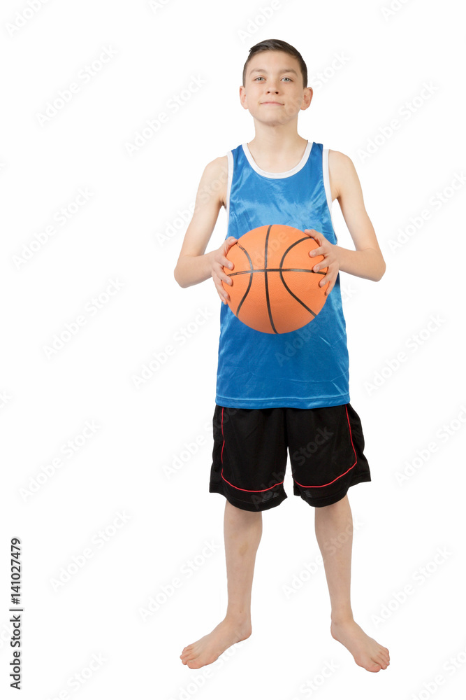 Young caucasian teenage boy with a basketball Young caucasian teenage boy with a basketball