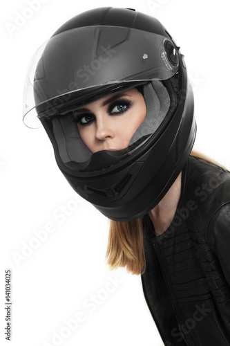 Portrait of young beautiful woman in biker helmet over white background © Olga Ekaterincheva