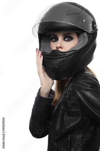 Portrait of young beautiful woman in biker helmet over white background © Olga Ekaterincheva