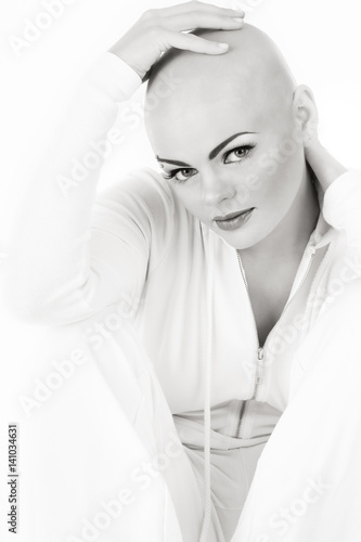 Black and white photo of young beautifil skinhead woman