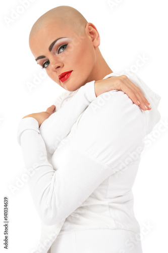 Young beautifil skinhead woman over white background
