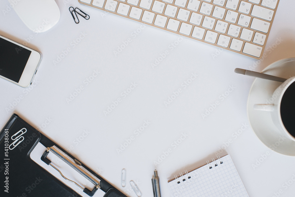 Office items on a white table. Frame for text Office items on a white table. Frame for text