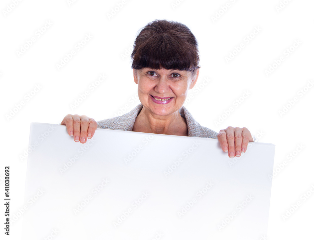 Mature woman leaning on white banner. Portrait against of white background Mature woman leaning on white banner. Portrait against of white background