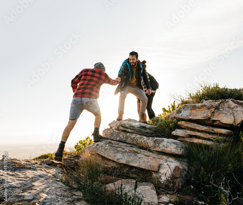Group of hikers walking in the nature