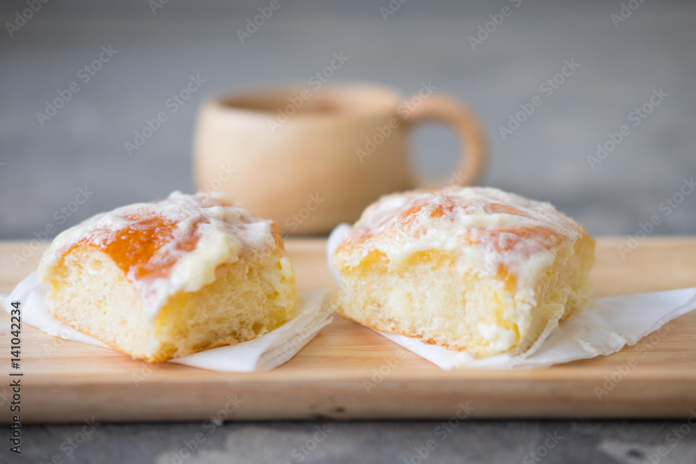 Fresh bread with icing, butter and sugar Fresh bread with icing, butter and sugar