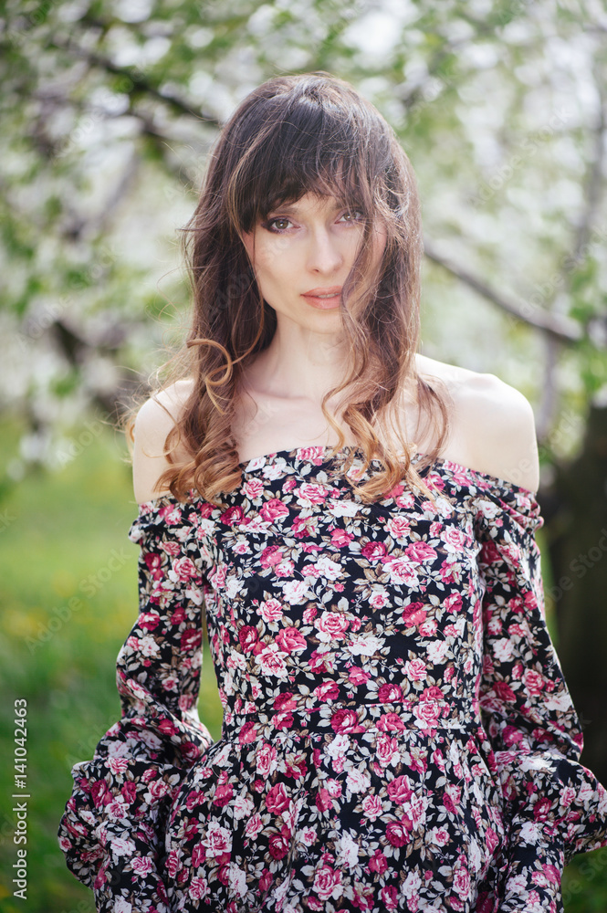 beautiful woman in dress in the gardens beautiful woman in dress in the gardens