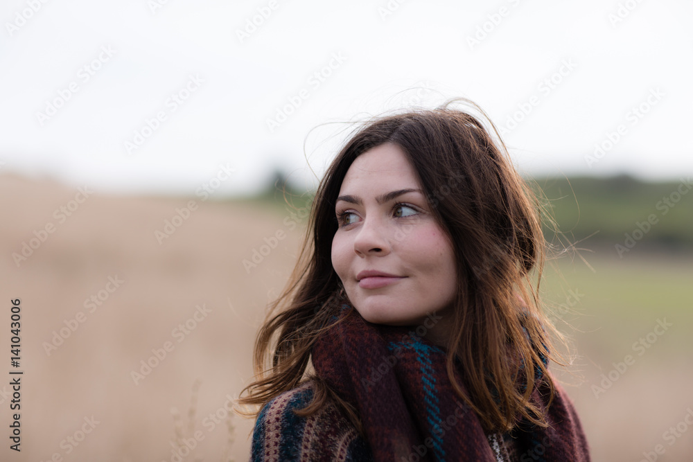 Young adult female walking in field of corn Young adult female walking in field of corn