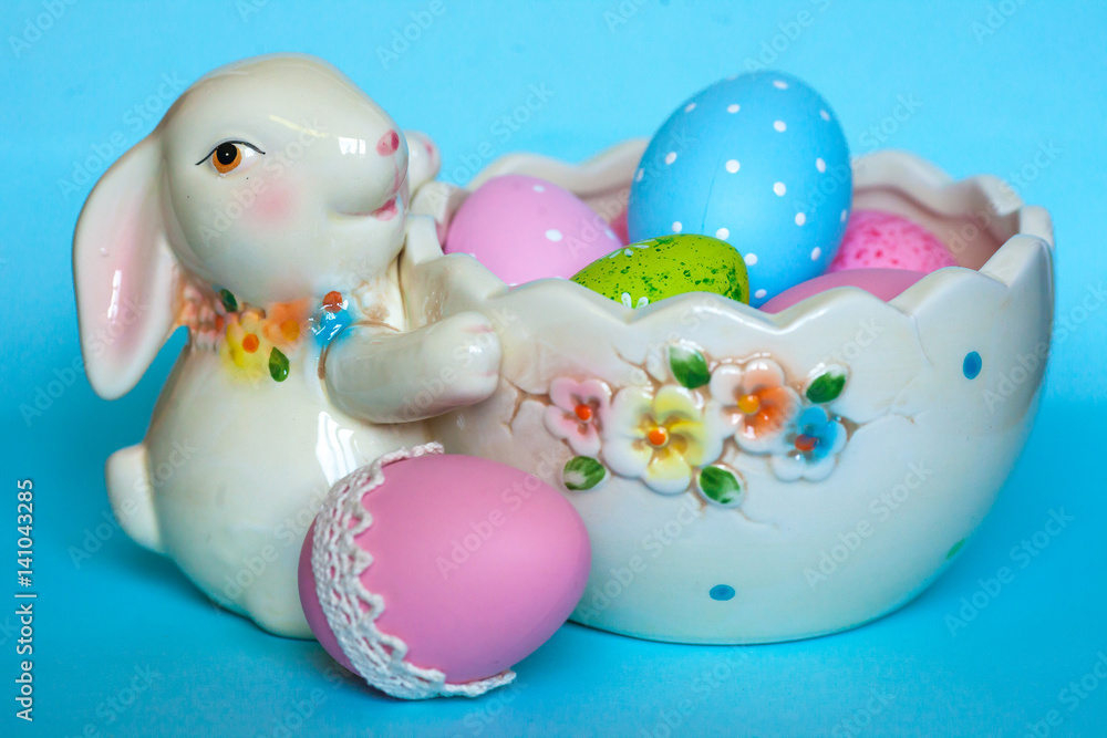 easter bunny with basket and eggs