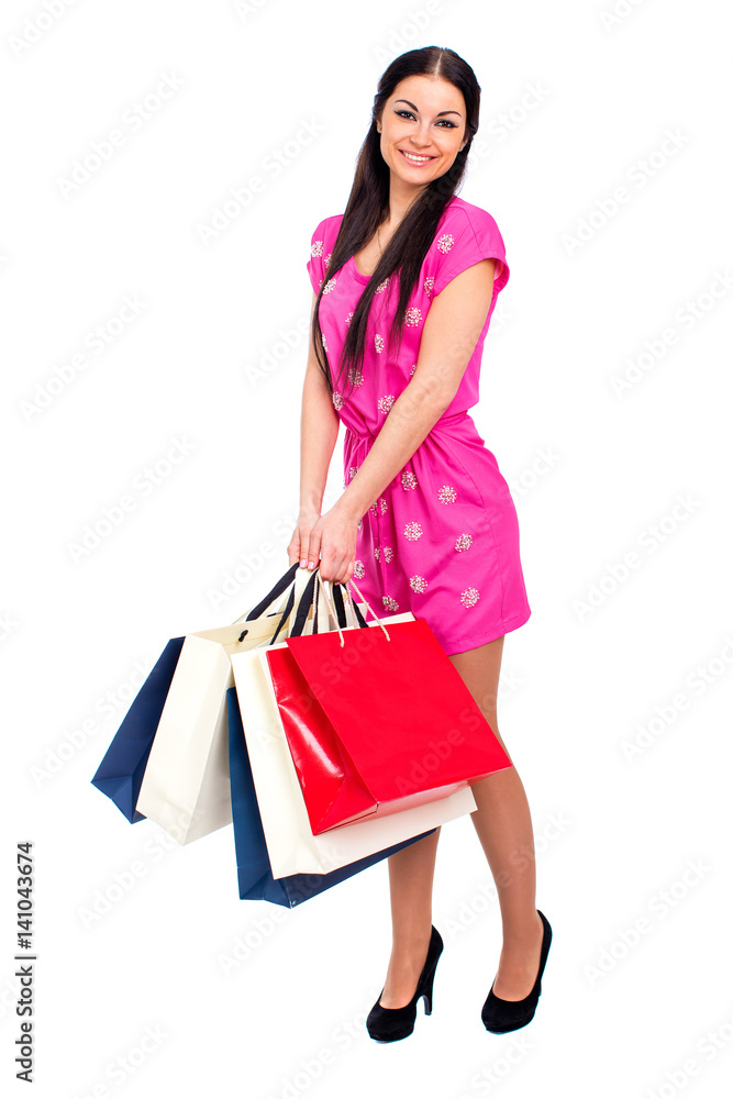 Young brunette woman with some shopping bags Young brunette woman with some shopping bags