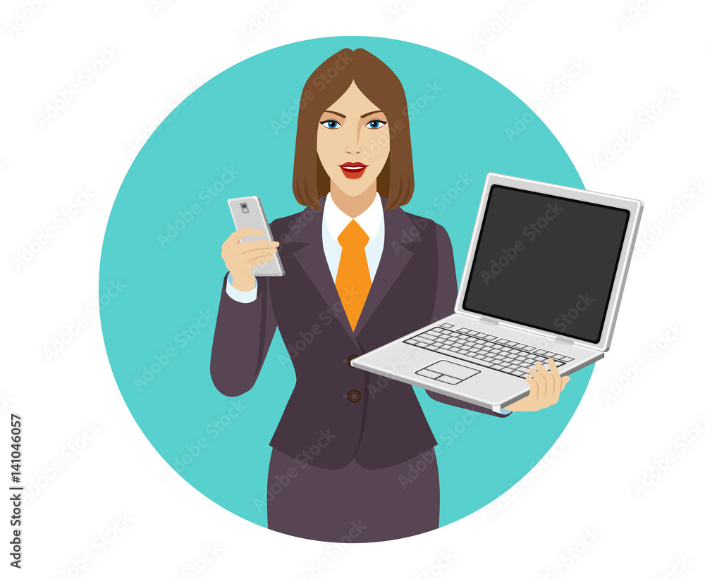 Businesswoman holding a laptop notebook and a mobile phone Businesswoman holding a laptop notebook and a mobile phone