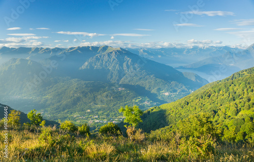 Hiking on peaks of Italian mountains with beautiful view to the lake Como © elinque