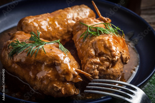 Tasty roulades beef on plate.