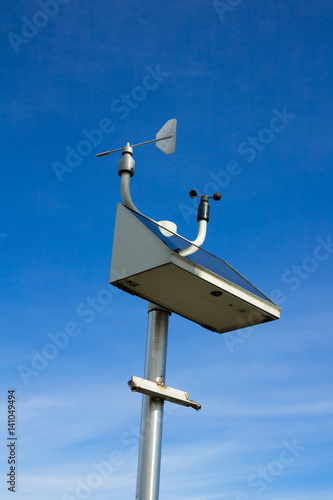 Detail of anemometer - meteorological device, tool and instrument for measurement and observation of weather and climate. Clear blue sky in the background. Copy space