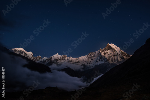Mt.Machapuchare in the reflection of sunset  with gain and soft focus