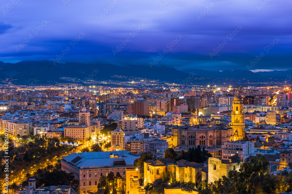 Panoramic cityscape of Malaga at evening