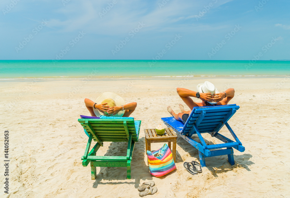 Couple on the beach at tropical resort Travel Couple on the beach at tropical resort Travel
