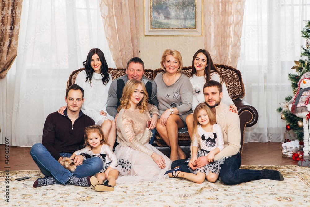 big happy family near Christmas tree