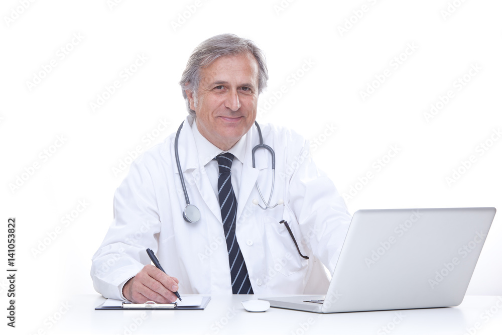 happy senior doctor with stethoscope working with laptop isolated on white happy senior doctor with stethoscope working with laptop isolated on white