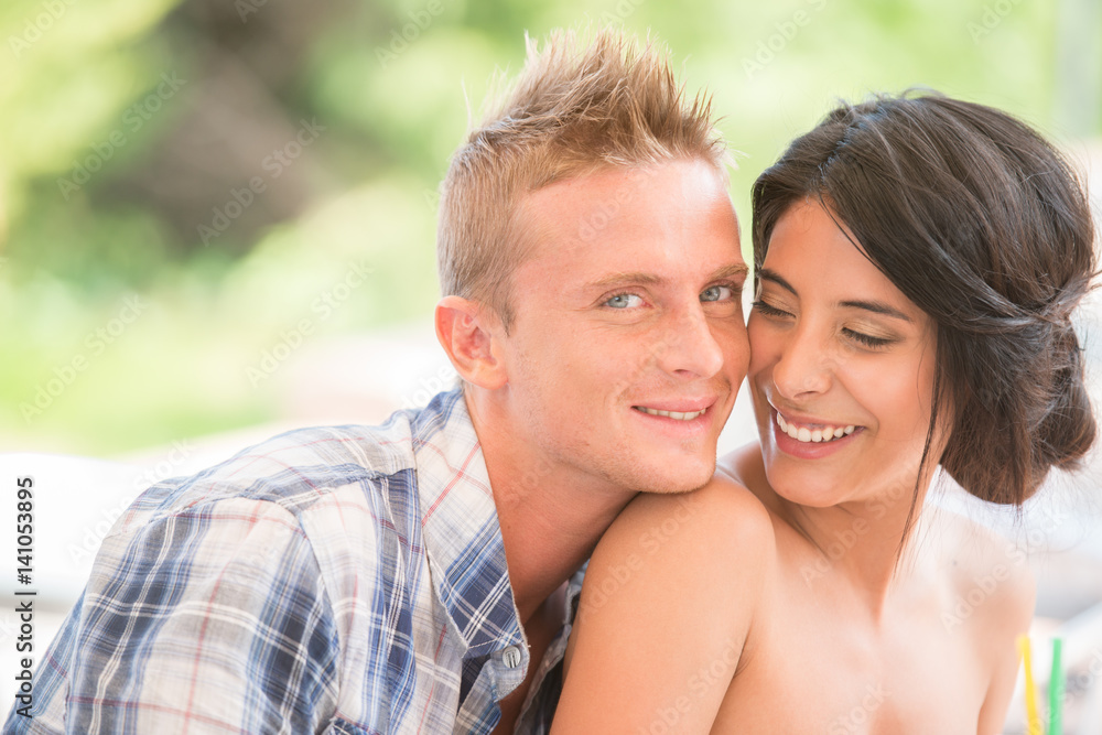young couple summer portrait in swimsuit with cocktail young couple summer portrait in swimsuit with cocktail