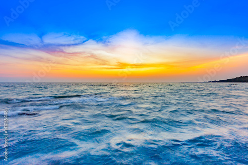 beautiful sunset at the sea with colorful shading sky