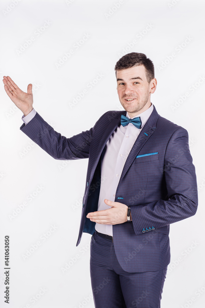 man presenting or showing something your text or product. human emotion expression and lifestyle concept. image on a white studio background. man presenting or showing something your text or product. human emotion expression and lifestyle concept. image on a white studio background.