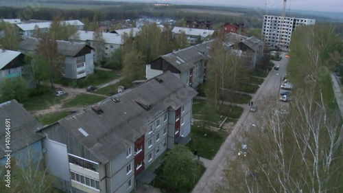 Roof of town apartment building aerial video photo