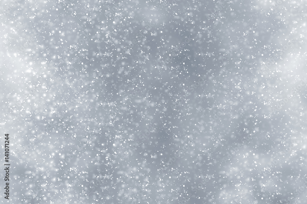 Obraz premium Snowflakes particles and bokeh or glitter lights on silver background. Christmas abstract template