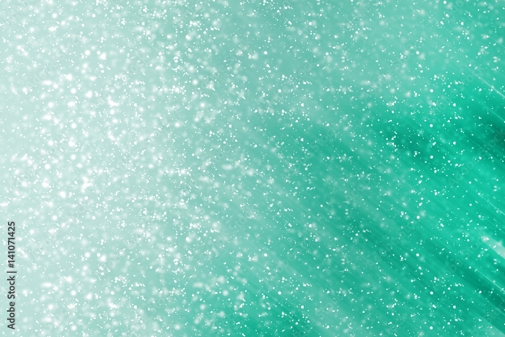 Fototapeta premium Green festive background sun and rays with glitter bokeh