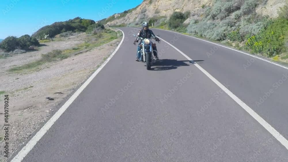 biker on the road in Sardinia biker on the road in Sardinia