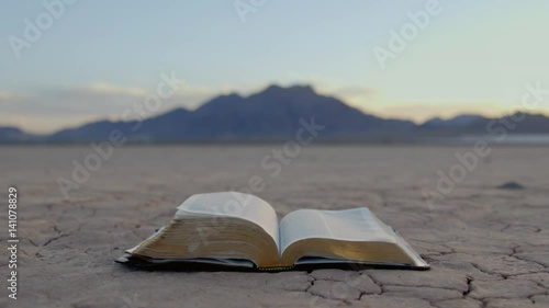 Bible Pages Flipping In Desert