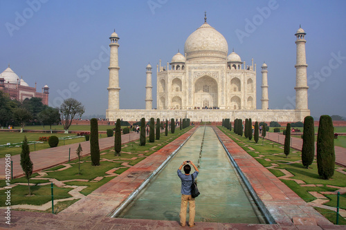 Photography Tourist photographing Taj Mahal in Agra, Uttar Pradesh, India