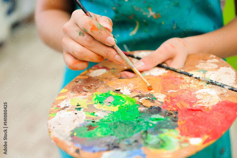 beautiful young girl draws a picture paints on art lesson beautiful young girl draws a picture paints on art lesson