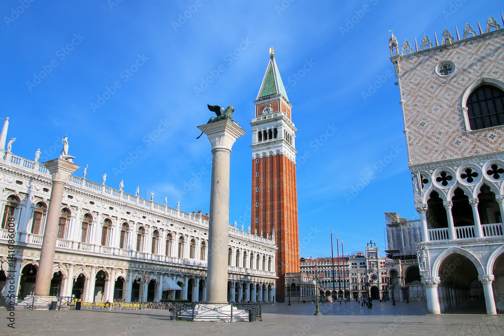 View of Piazzetta San Marco with St Mark's Campanile, Lion of Venice statue, Biblioteca and Palazzo Ducale in Venice, Italy