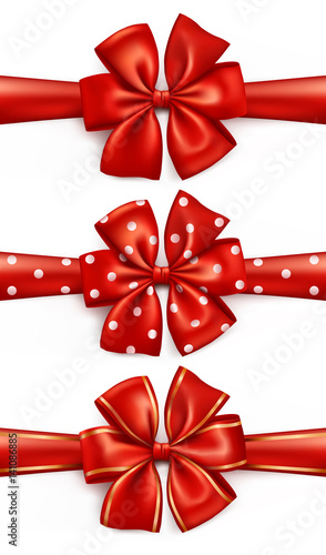 Red ribbon gift bows with polka dots and golden rims
