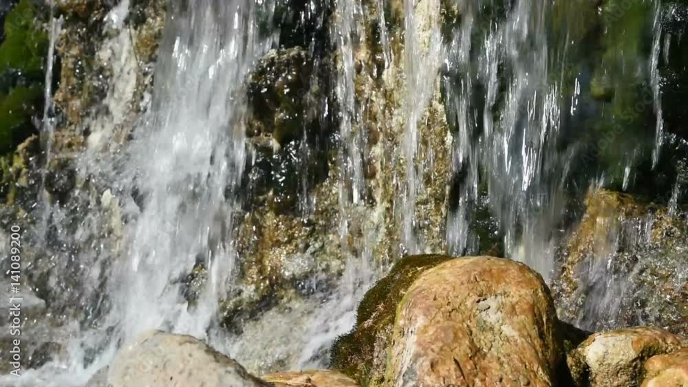 Beautiful waterfall river details in a sunny day Beautiful waterfall river details in a sunny day