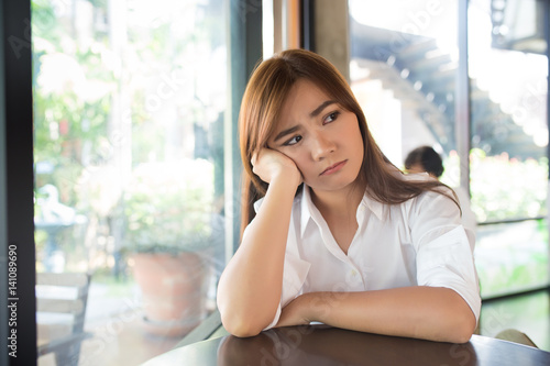 Woman so sad at coffee shop Free Download Woman so sad at coffee shop - GFXLoad