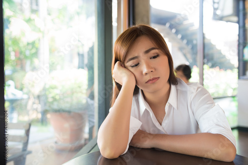 Woman so sad at coffee shop Free Download Woman so sad at coffee shop - GFXLoad