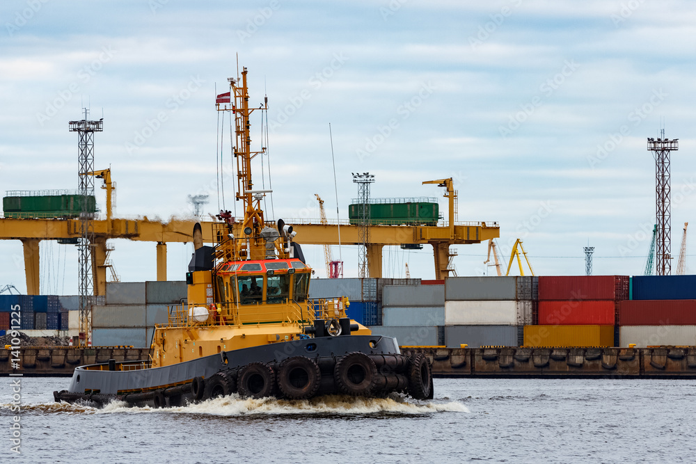Fototapeta premium Tug ship in cargo port