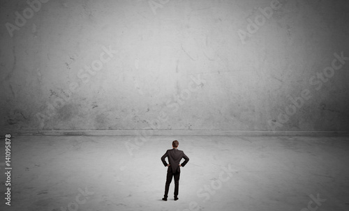 Small business person in large empty space