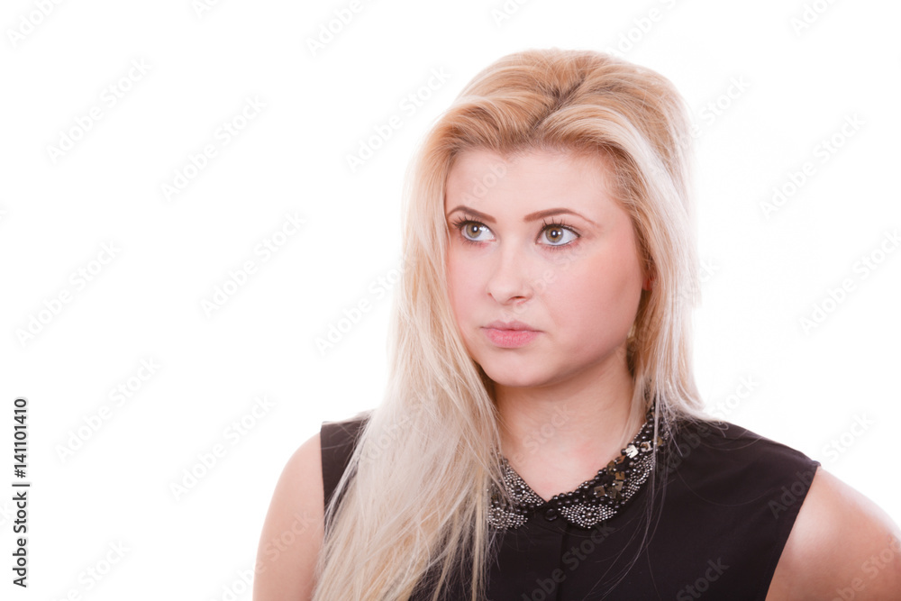 Portrait of blonde woman with serious face expression Portrait of blonde woman with serious face expression