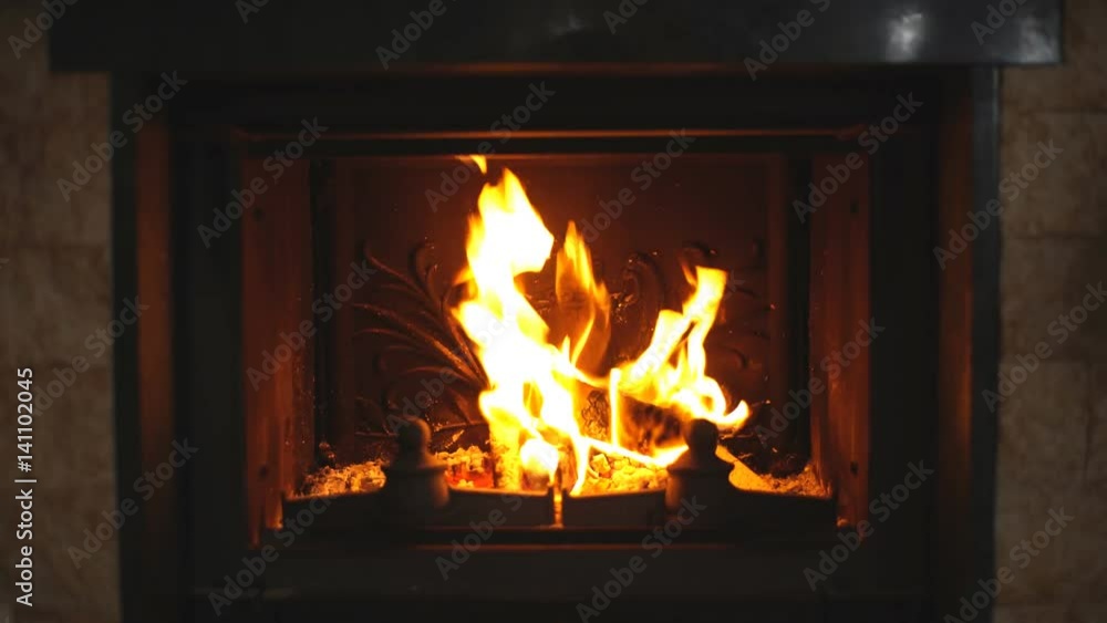 Burning fireplace. Fireplace as a piece of furniture Burning fireplace. Fireplace as a piece of furniture