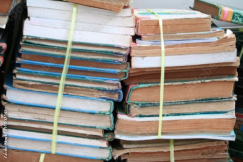 Blurred focus with  Stack of Used Old Books in the School Library